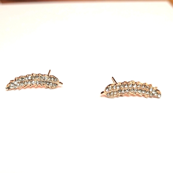 Beautiful leaf shaped Rose Gold color earrings covered w/ crystals. Brand new. - Picture 4 of 5